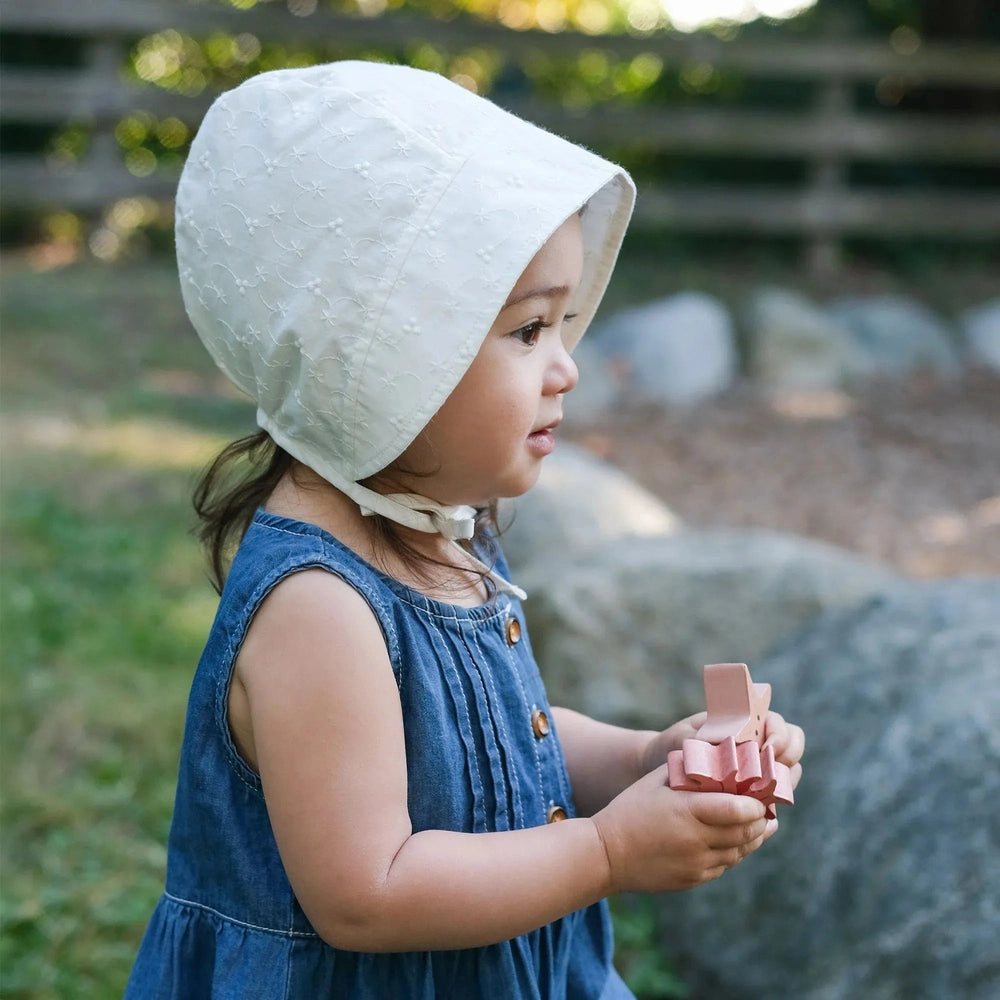 JAN & JUL Jan & Jul Baby Bonnet - White Eyelet quilted stitching with tie strings under chin img 2/5