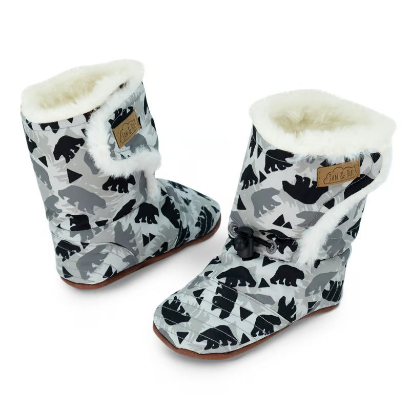 Jan & Jul Baby Stay-Put Winter Booties Bear in grey bear-print fabric with white faux-fur lining, two booties shown standing.