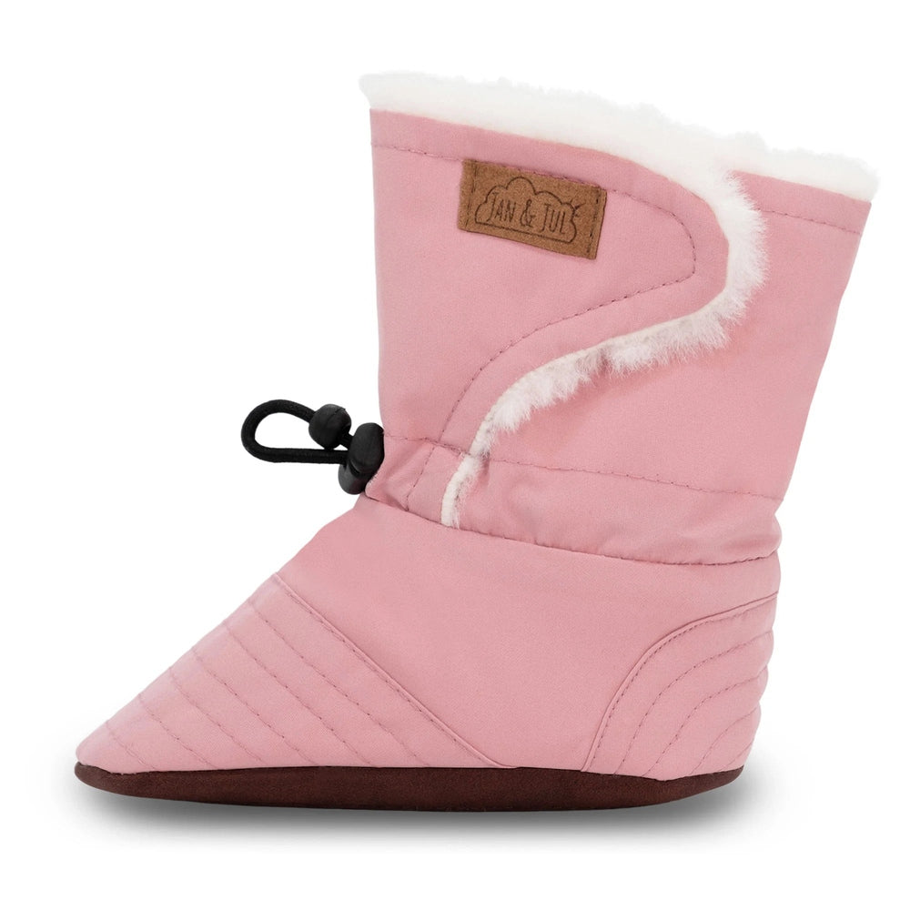 JAN & JUL Baby Stay-Put Winter Booties in dusty pink with white faux-fur lining, toggle tightened for snug fit.