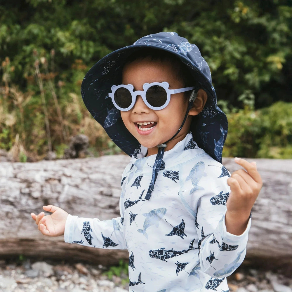 JAN & JUL Jan & Jul Bear Sunglasses W/Black Lens - Light Blue round children sunglasses shown in product color from image 3 of 7 with flexib