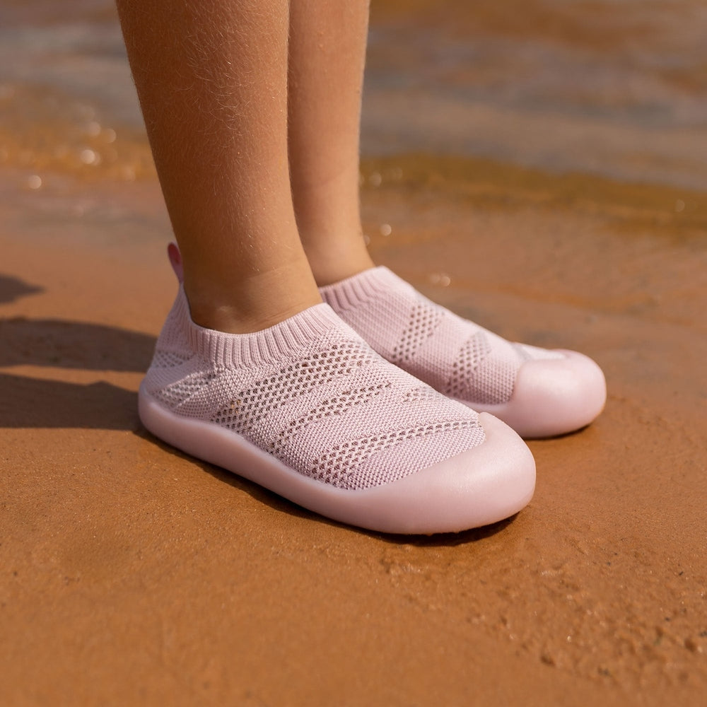 JAN & JUL Jan & Jul Jelly Jumper Flow Shoes Soft Pink pair of baby shoes shown in image 3 of 7 with mesh upper, velcro strap and contrasting