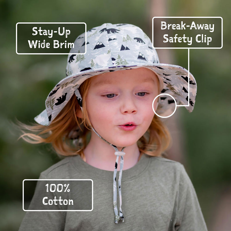 Jan & Jul cotton floppy safari hat for babies, white with forest print and adjustable chin strap