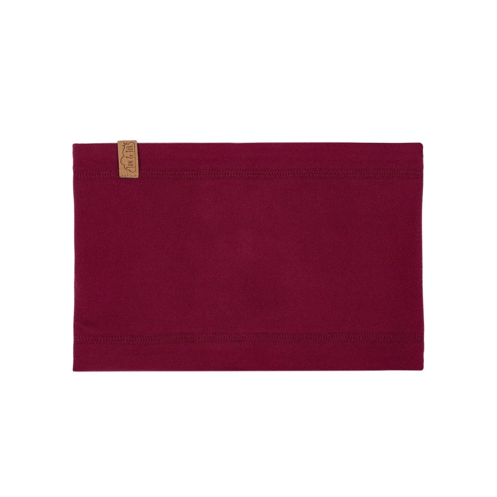 Jan & Jul Kids Fleece Neck Warmer in burgundy with tan brand tag, soft fleece fabric.