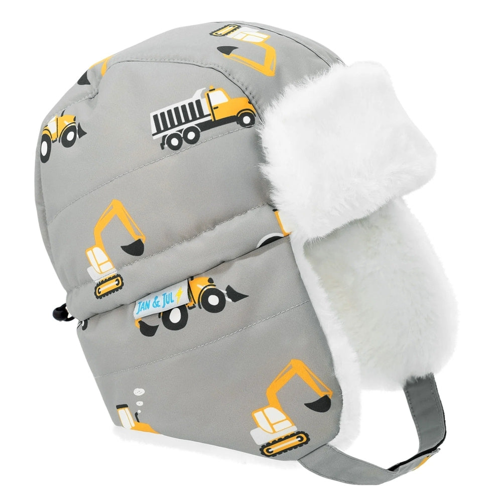 JAN & JUL Kids Insulated Winter Hat Grey Construction with white faux-fur ear flaps, featuring excavator prints.