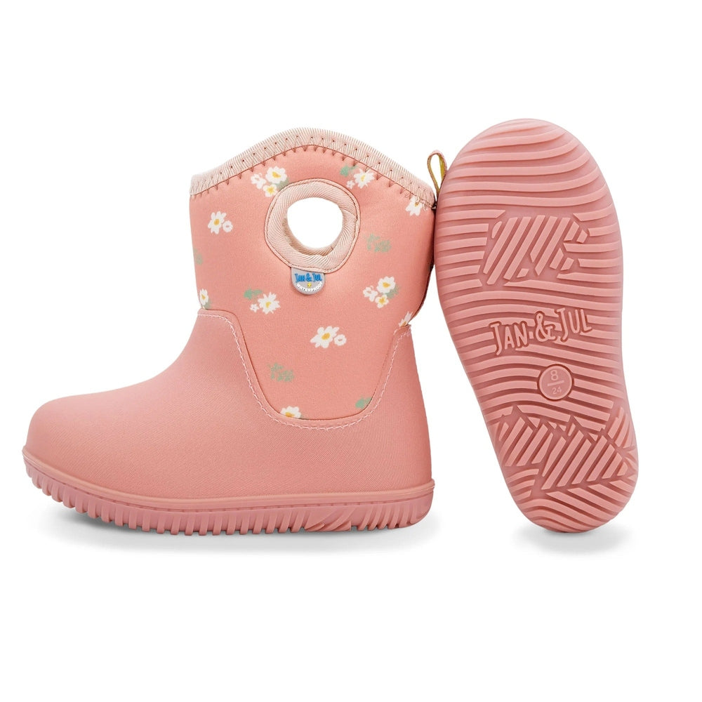 Pair of Jan & Jul kids lite waterproof boots in apricot with white flower print, toddler footwear