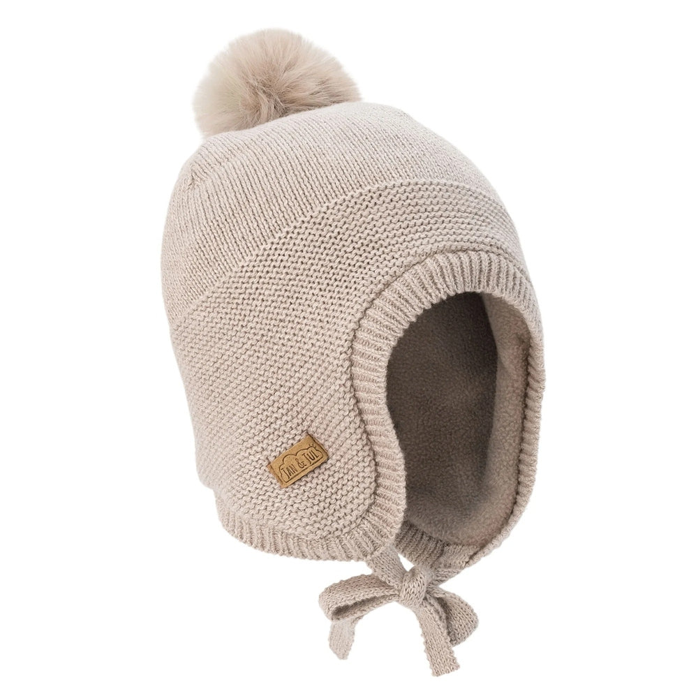 JAN & JUL kids beige wheat field knit hat with pom-pom, ear flaps, and tie strings