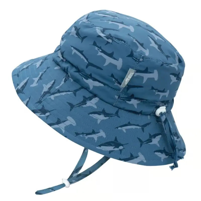 Jan & Jul Kids Water Repellent Bucket Hat Shark, blue with shark print and adjustable chin strap.