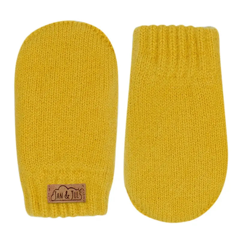Jan & Jul Knit Mitten Mustard for babies; soft yellow knit pair with visible brand patch.