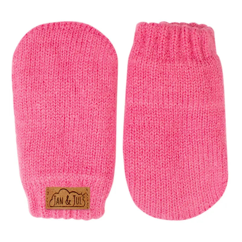 Jan & Jul Knit Mitten Watermelon Pink pair laid flat, showing soft knit texture and brown brand patch.