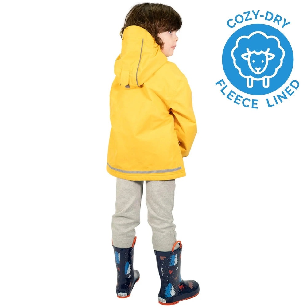 Jan & Jul Waterproof Cozy Dry Rain Jacket Yellow worn by toddler with hood; fleece-lined interior, grey pants, blue rain boots