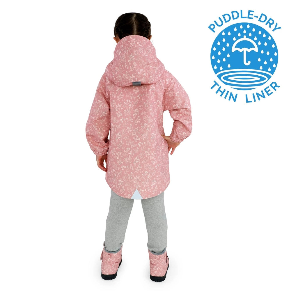 Jan & Jul Waterproof Puddle-Dry Rain Jacket Prairie Flowers worn by a girl with hood up, back view.