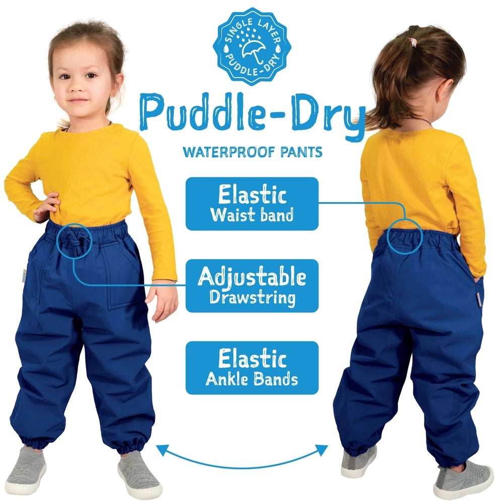 Jan & Jul Waterproof Puddle-Dry Rain Pants Lavender, elastic waist with adjustable drawstring and ankle bands, shown on a child.