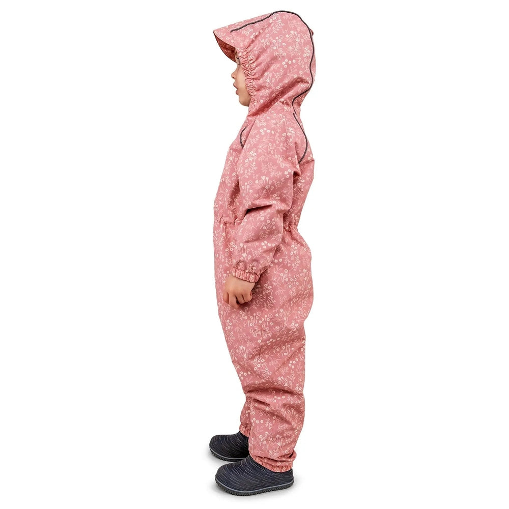 JAN & JUL Waterproof Puddle Dry Rain Suit Prairie Flowers, pink floral hooded rain suit worn by a child in side profile.