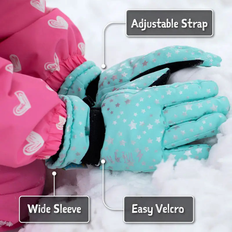Jan & Jul Waterproof Toasty Dry Snow Gloves Black with teal/pink accents; adjustable strap secured with Velcro in the snow.