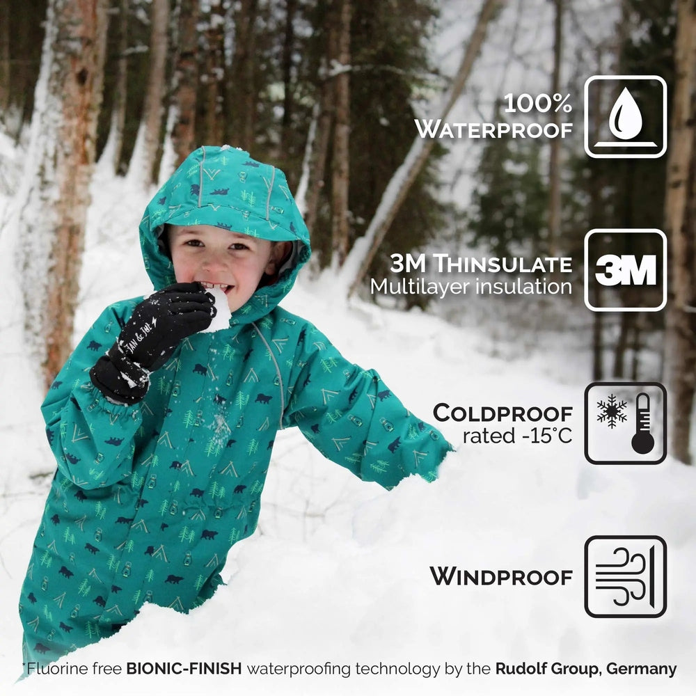 JAN & JUL Waterproof Toasty Dry Snow Gloves Wildberry; child in teal gloves brushes snow in a snowy forest.