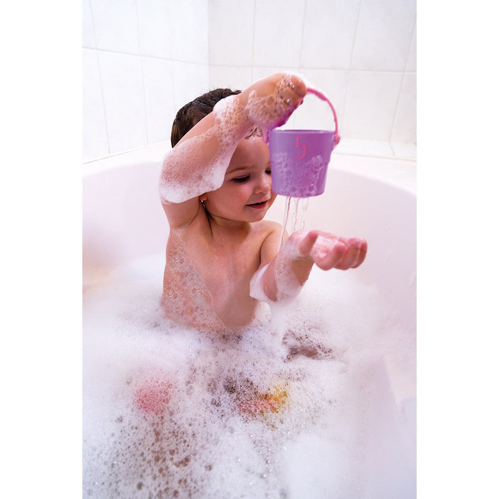 JANOD 5 Activity Buckets bath toy; purple bucket with bubbles and a child playing in a bathtub