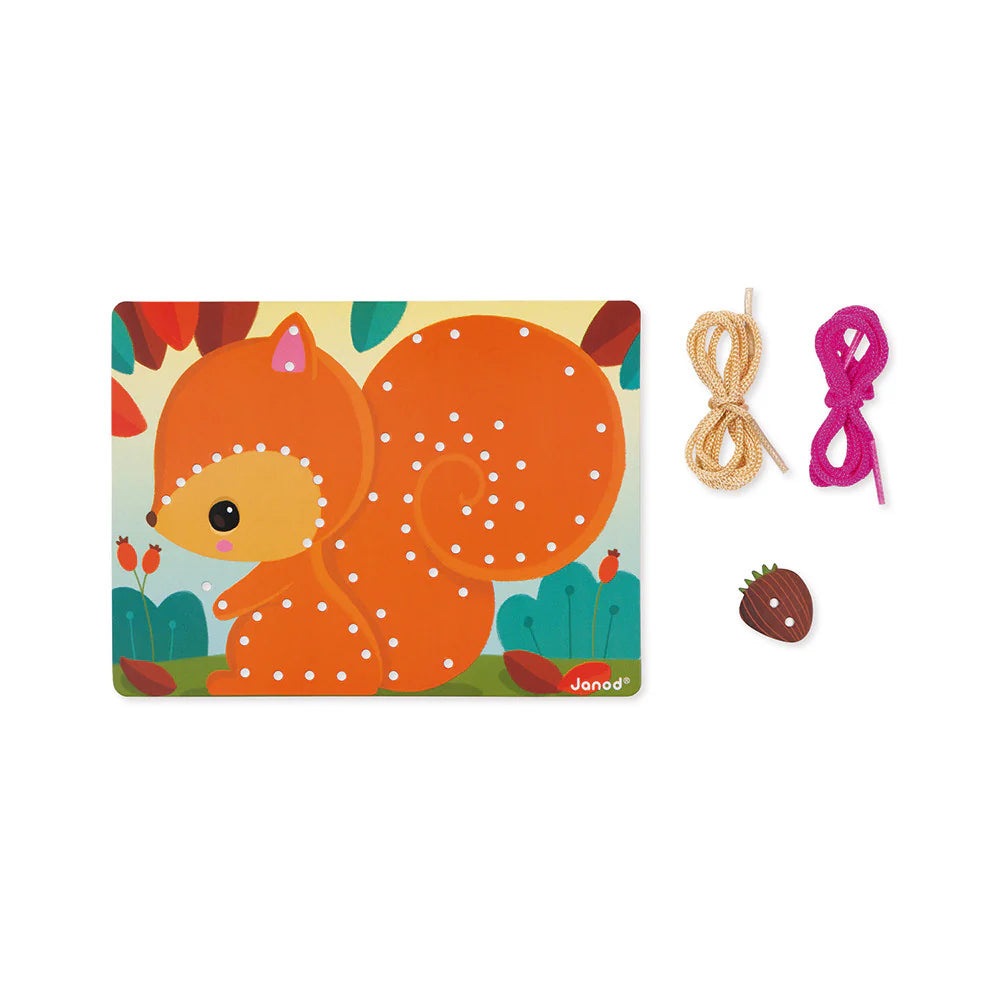 Janod Lacing Game Animals toy set featuring an orange fox illustration, beige and pink laces, and a wooden bead