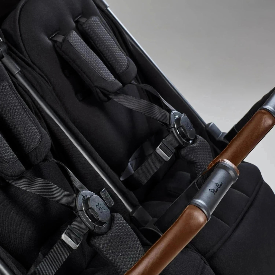 Silver Cross Jet Double Travel Stroller in Black — dual harness view