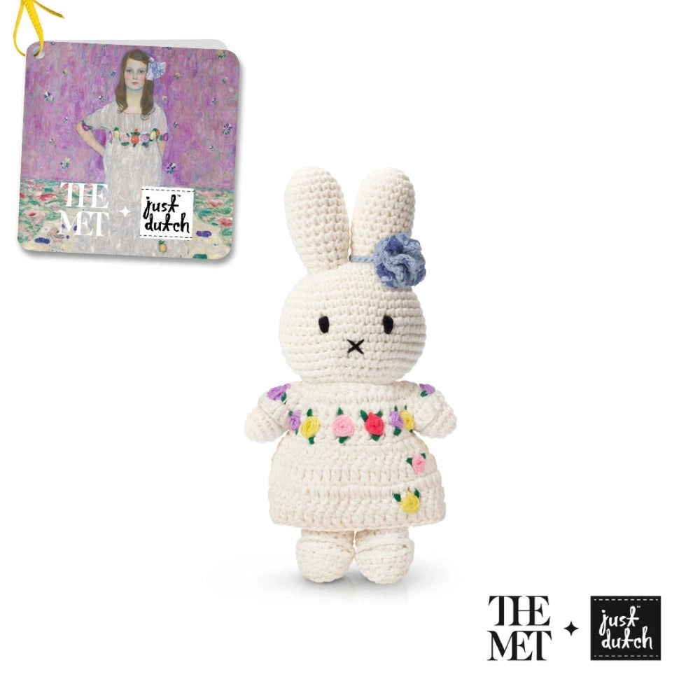 Just Dutch Miffy In Her Gustav Klimt Mada Primavesi Inspired Dress crocheted bunny plush with floral embroidery, standing upright.