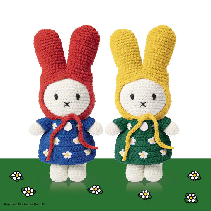Just Dutch Miffy plush bunny dolls in flower dresses; two colors: green with yellow hat and blue with red hat.