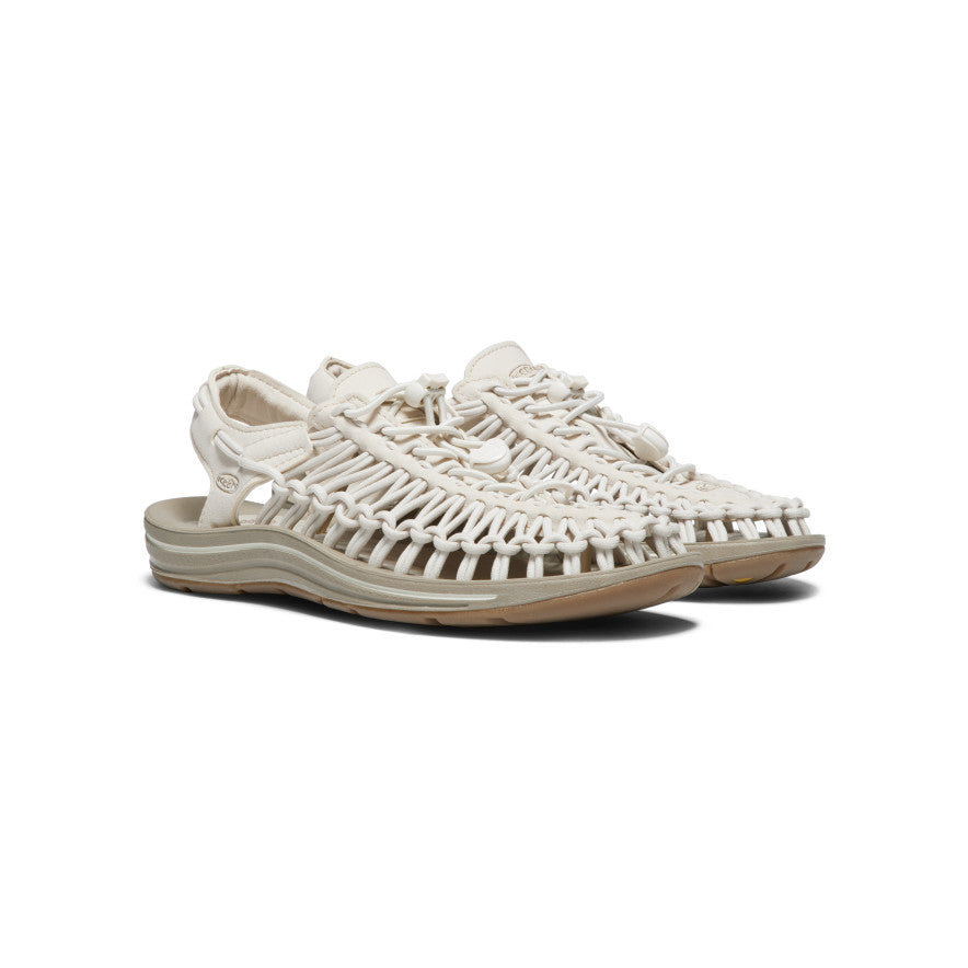 Keen Women's UNEEK Sneaker White Cap/Cornstalk pair front-angle view