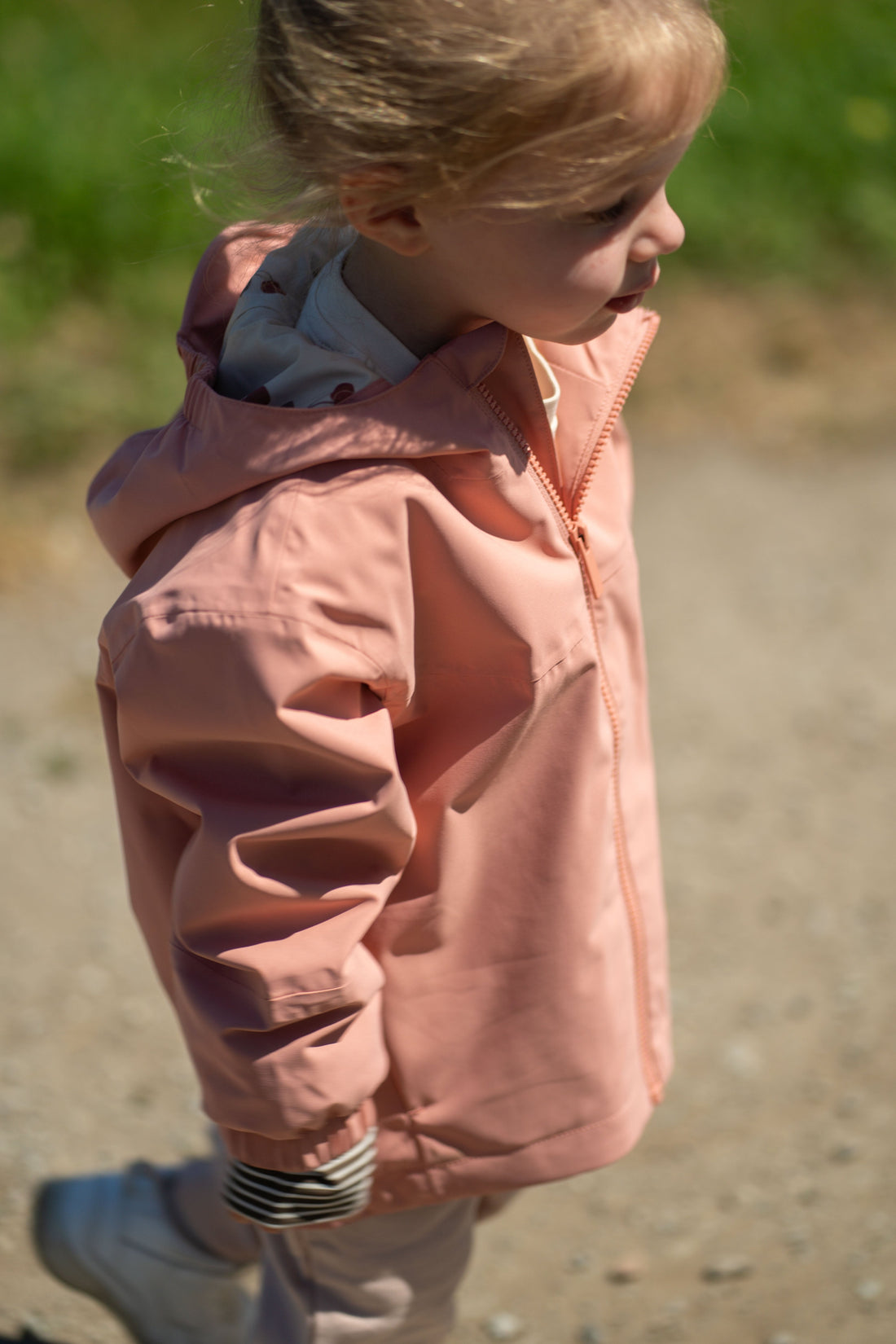 Kidorca Tofino Kids Rain Jacket - Cameo / Cherry – Outdoor side view