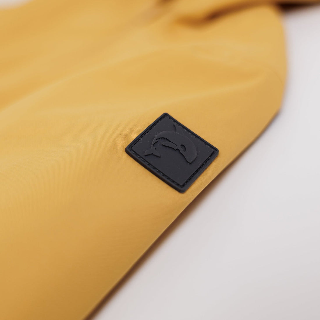 Kidorca Tofino Kids Rain Jacket - Spruce Yellow – Sleeve logo