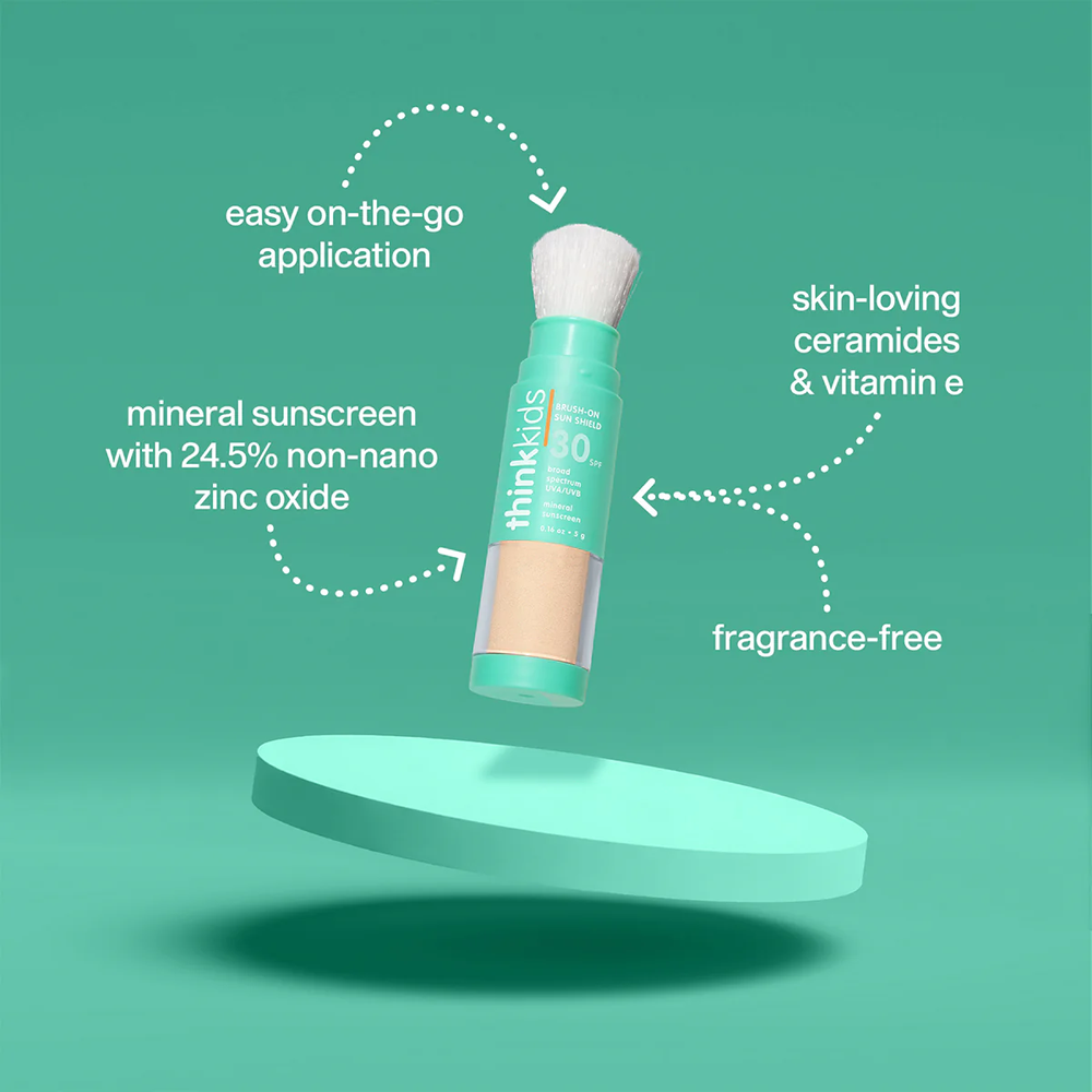 THINK Think Kids Mineral Based Sun Shield Brush-On SPF 30 brush applicator with white bristles and tan powder window img 2/3