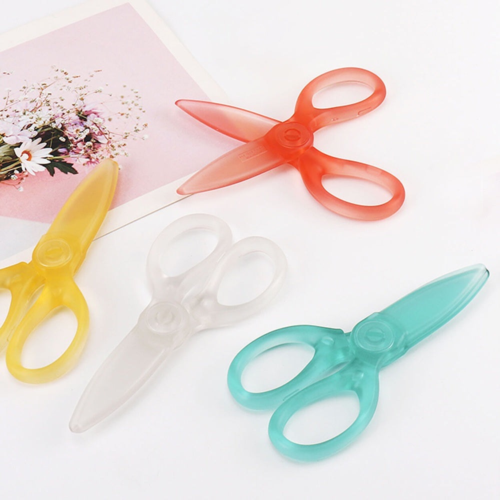 Kokuyo bladeless scissors set of 4 in pink, yellow, clear, and teal