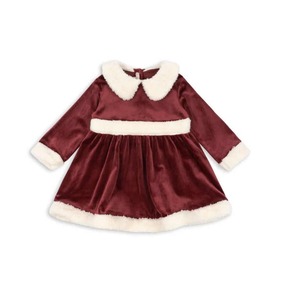 Konges Slojd Christmas Dress Red Dahlia: burgundy velvet dress with white faux-fur collar, cuffs and hem, laid flat.