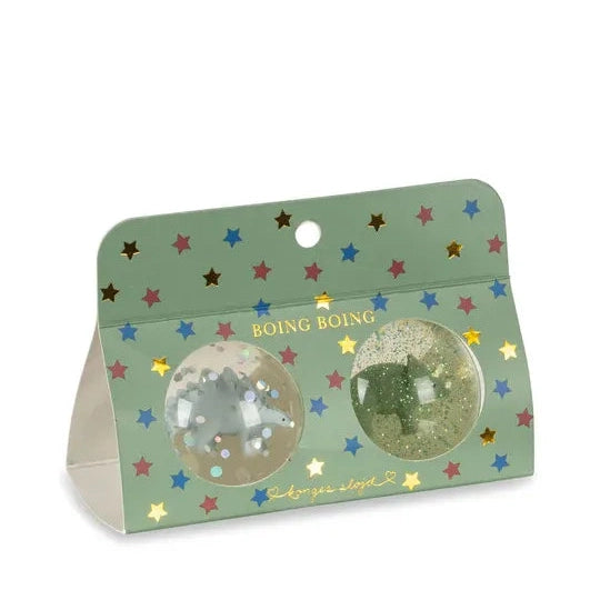 Konges Slojd Glitter Bouncing Ball Set Dino in green starry packaging with two glittery balls visible