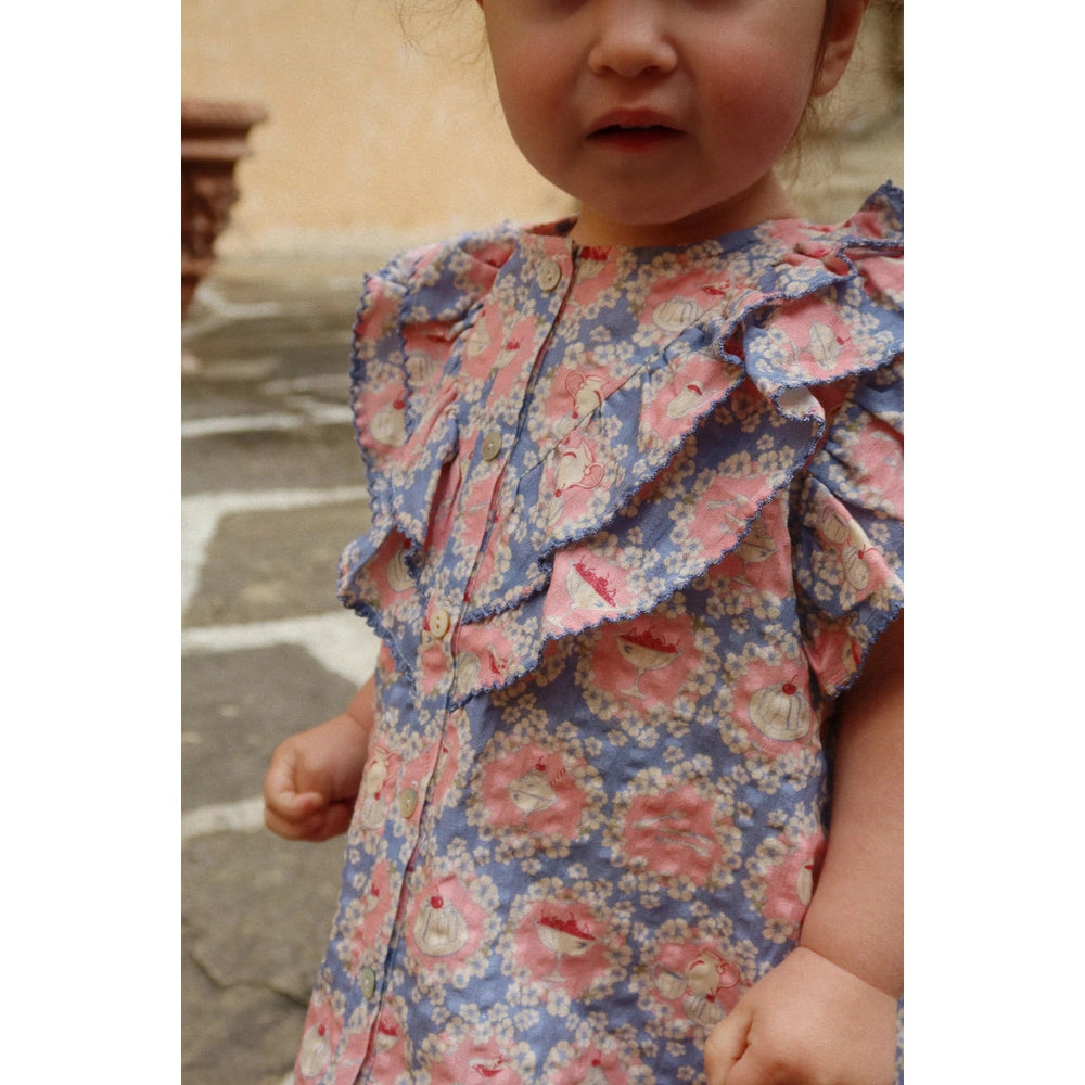 Konges Slojd Kim Frill Shirt Snack Time Shirt in Blue-Pink Floral with ruffle front.