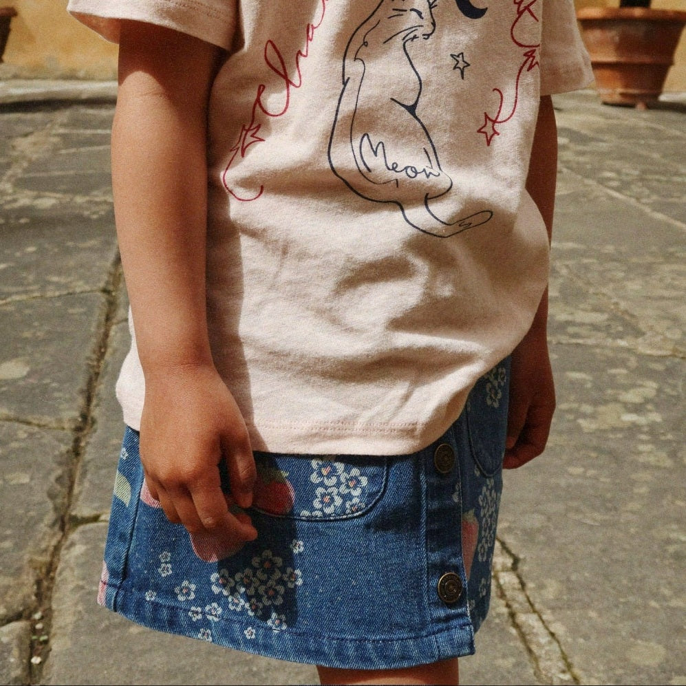 Konges Slojd Magot Skirt Marmelade Sun in blue denim with floral print and front pockets.