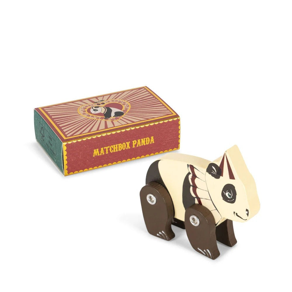 Konges Slojd Matchbox Panda wooden pull-along toy with brown wheels, shown beside its vintage-style box.