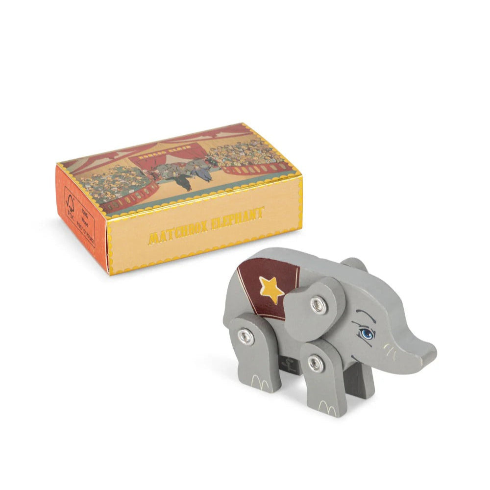 Konges Slojd Matchbox Animals elephant figure with movable joints, shown beside colorful box.