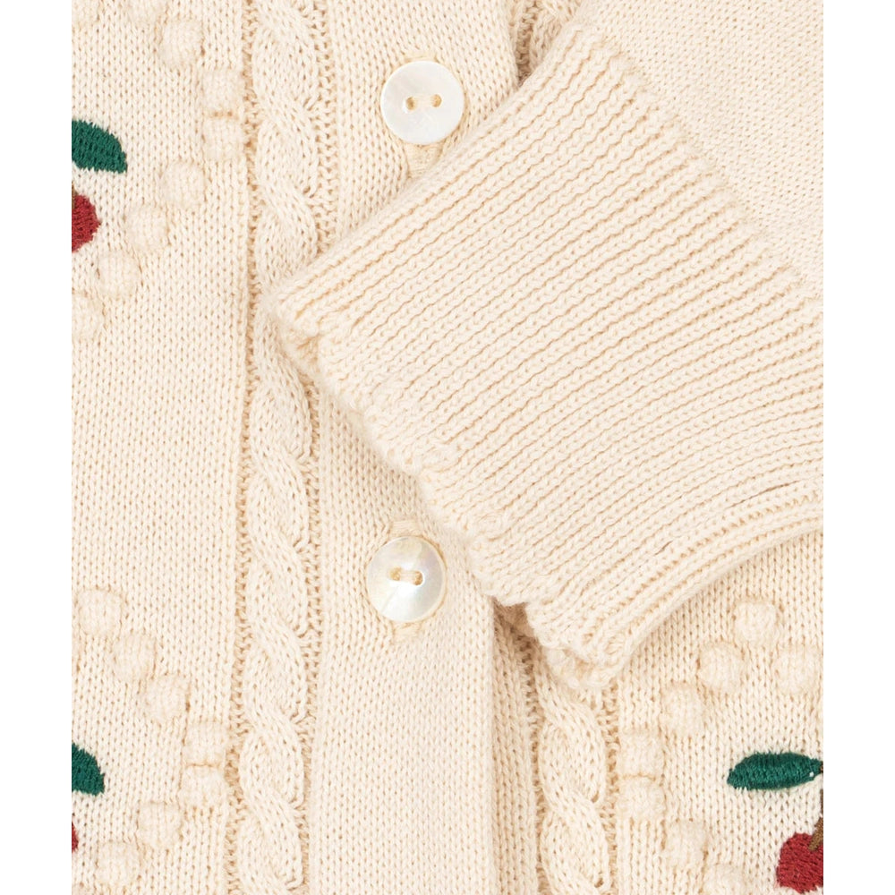 Konges Slojd Soleil Cardigan in Pearled Ivory with button front and cherry embroidery, cable knit.