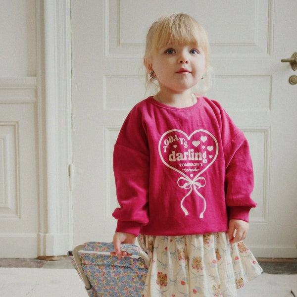 Konges Slojd Velou Blouse Gots Sangria for toddlers, pink velour top with heart bow graphic.