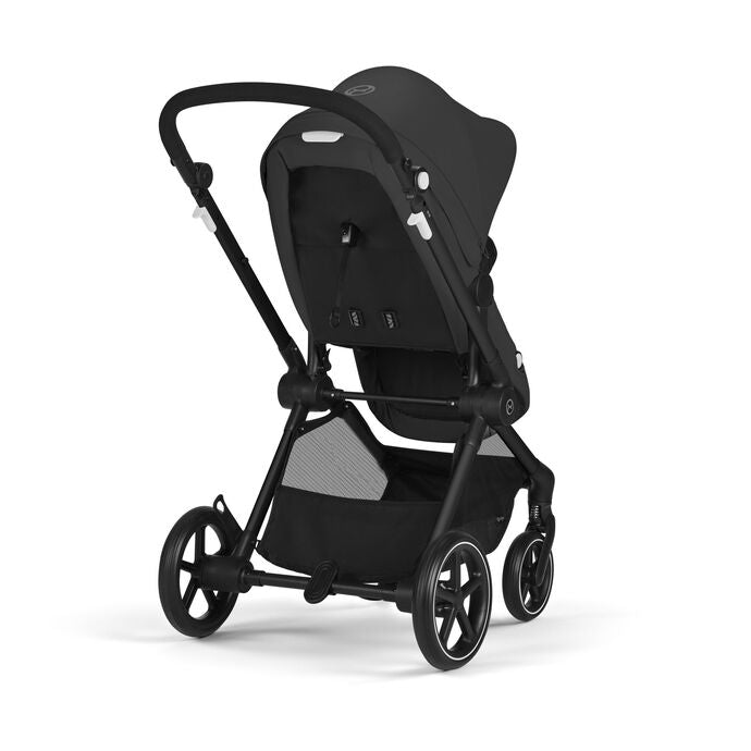 Lifestyle image of the Cybex EOS 2-in-1 Stroller Black Frame in black with canopy and storage basket.