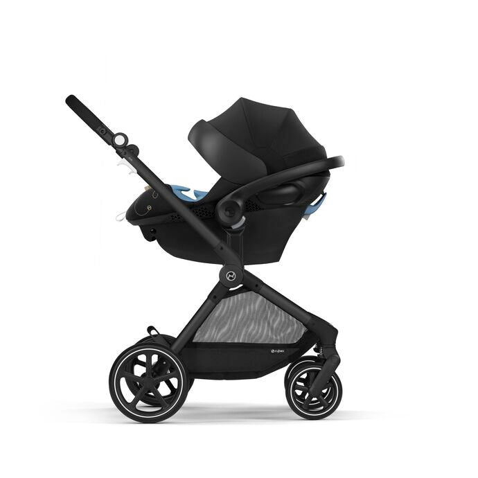 Lifestyle image of the Cybex EOS 2-in-1 Stroller Black Frame with bassinet in moon black on black frame.
