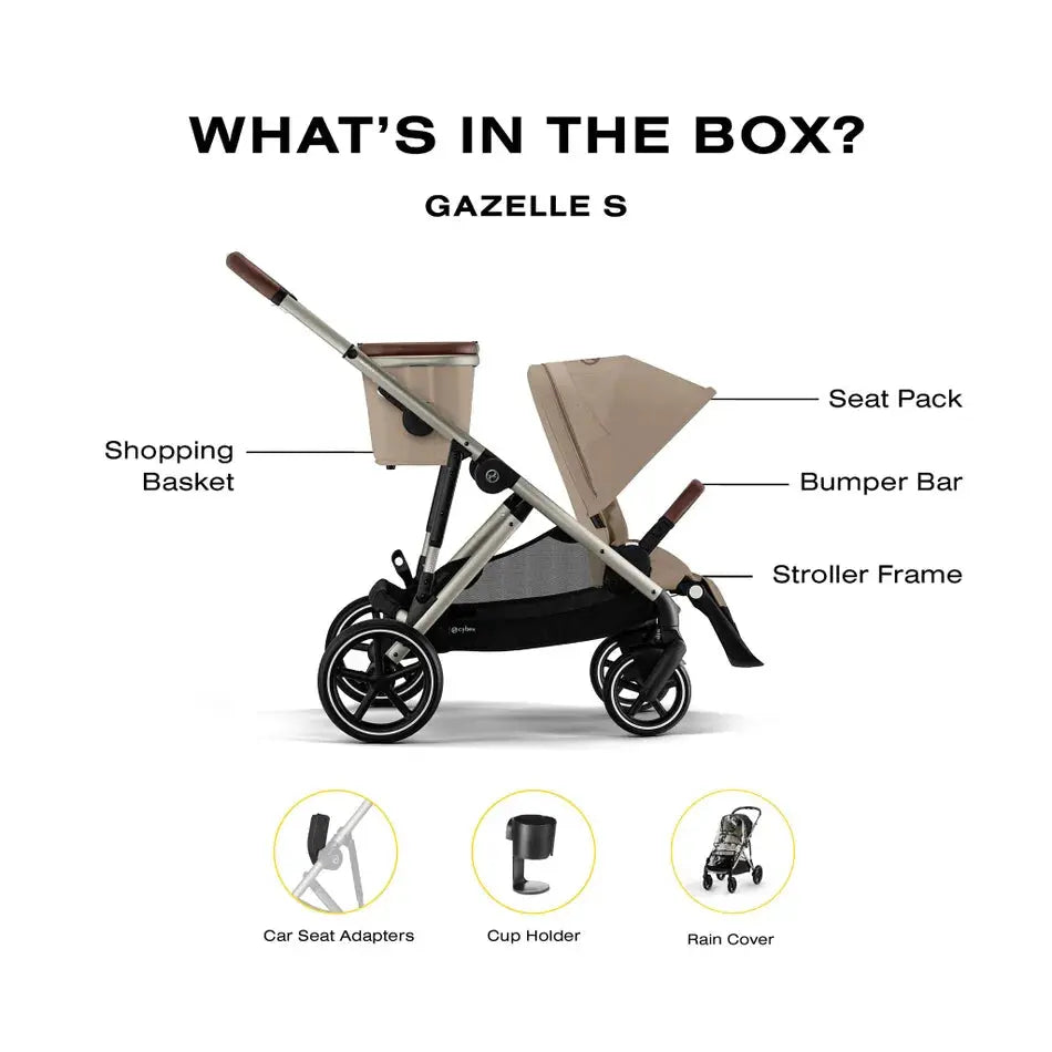 Lifestyle image of the Cybex Gazelle S V2 Stroller in beige with brown accents, showcasing seat pack, bumper bar, and shopping basket in use.