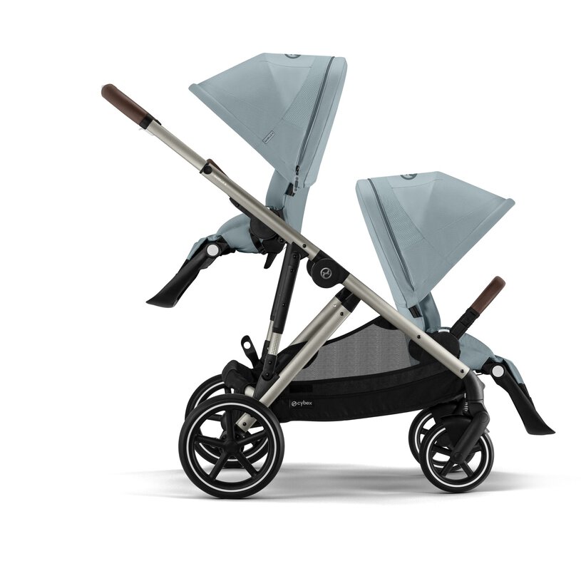 Lifestyle image of the Cybex Gazelle S V2 Stroller in stormy blue double seat configuration.