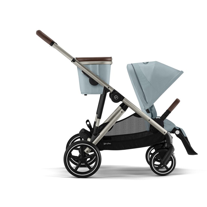 Lifestyle image of the Cybex Gazelle S V2 Stroller in stormy blue with taupe frame front view.