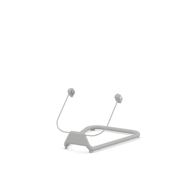 Lifestyle image of the Cybex Lemo2 Bouncer Base in grey, a u-shaped frame with two upright arms ready to hold a baby bouncer.