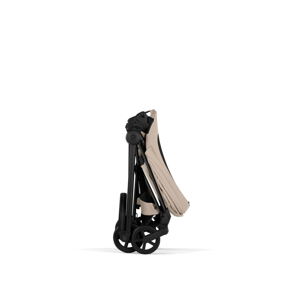 Cybex Platinum Mios 5 Matte Black frame with Cozy Beige Lux Seat — folded view