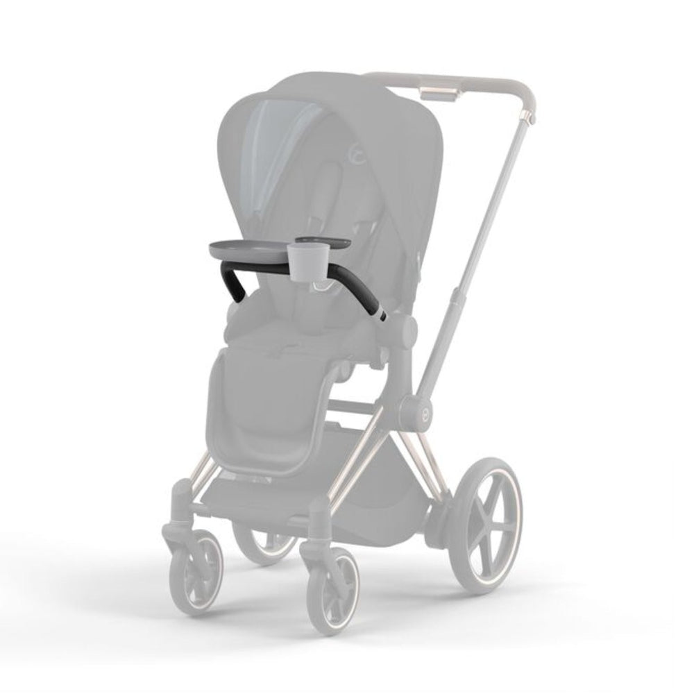 Lifestyle image of the Cybex Platinum Stroller Snack Tray Black with cup holder mounted on a baby stroller.