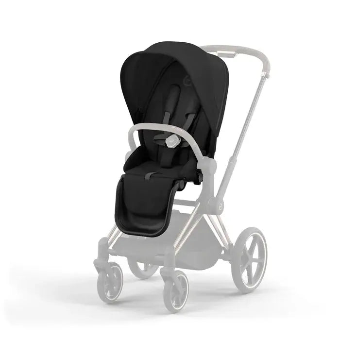 Lifestyle image of the Cybex Priam4/Ep Seat Pack stroller in black with canopy and silver frame, ready for a stroll.