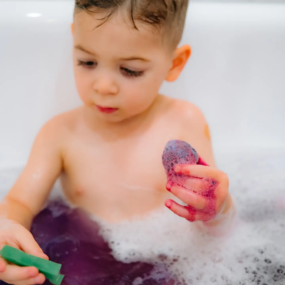 LOOT TOY CO. Loot Toy Co Bath Squiggler Bath Fizzy With Sponge Toy hooded bath towel shown in image 3 of 6 with animal-inspired details and