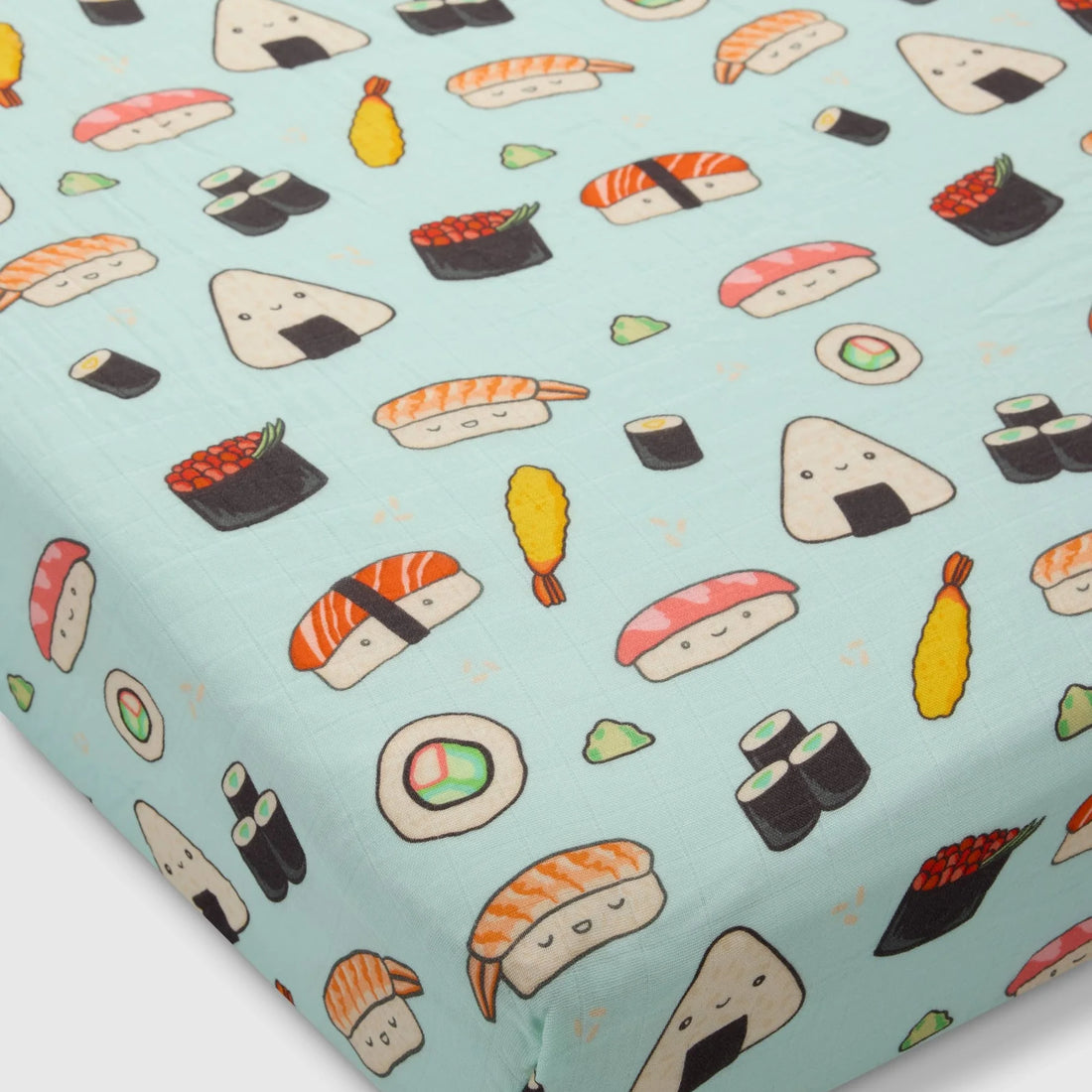 Loulou Lollipop Baby Muslin Fitted Crib Sheet in Tanboocel® Bamboo Viscose - Sushi — fitted sheet shown over a mattress corner.