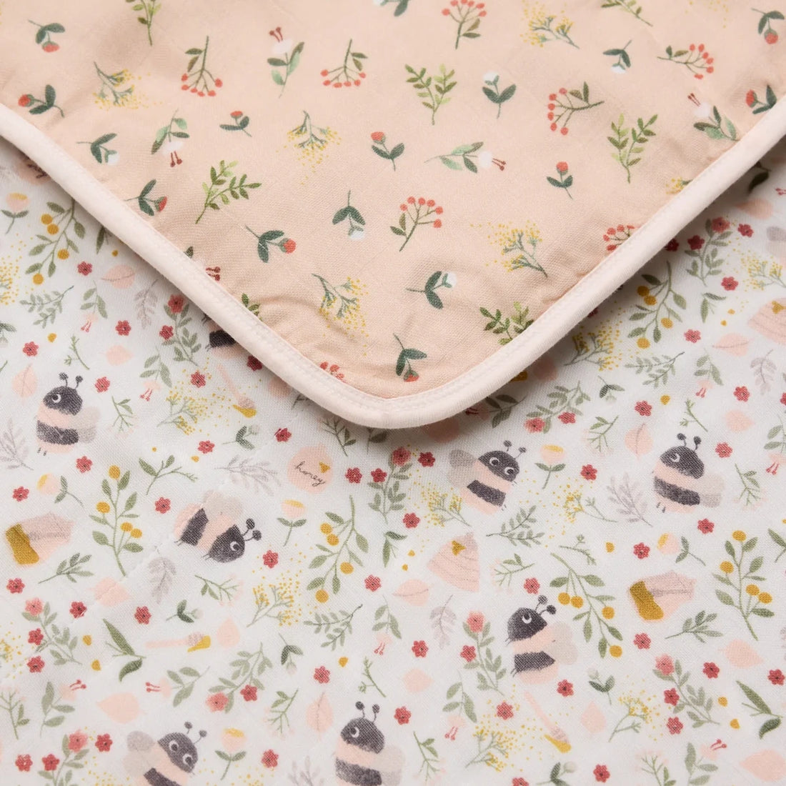 Loulou Lollipop Baby Muslin Quilt in Tanboocel® Bamboo Viscose - Bumble Bees — close-up of fabric, print and construction.