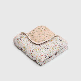 Loulou Lollipop Quilt Blanket in Muslin